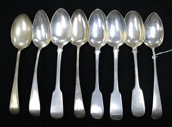 Eight silver fiddle and Old English pattern table spoons, George III and later